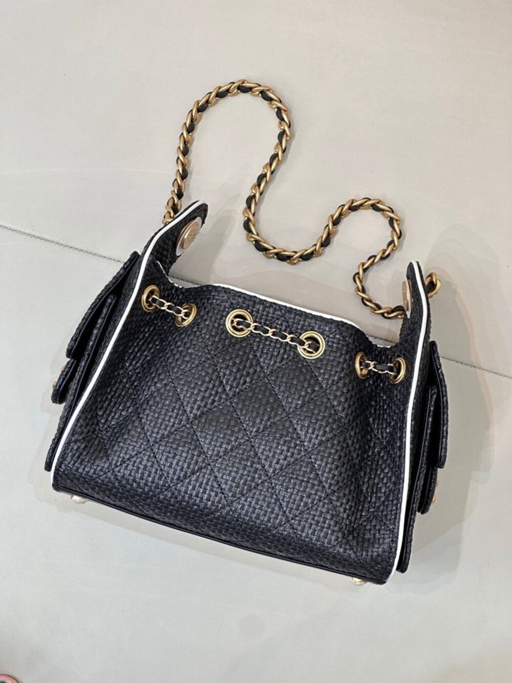 Chanel Quilted Leather Bucket Bag White Edge Piping Trim Chain Strap Designer Ba